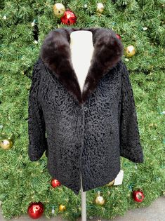 "Elegant silky and smooth textured fur is made of real Broadtail Persian Lamb with a gorgeous ranch mink collar. This jacket is from the 1950s.  *Lined with a brocade silky, satin fabric.  *Two side pockets with a single hook and eye closure at the top.  *Features a ranch mink collar *Turned up cuffs for that bracelet length can be let down Perfect to wear with jeans on a brisk day. Condition looks to be very excellent, no holes, wear or tears. I purchased this from the original owner whose name Consumer Protection, Real Vintage, Mink Fur, Fur Jacket, Vintage 1950s, Satin Fabric, Persian, Jackets & Coats, Jackets For Women