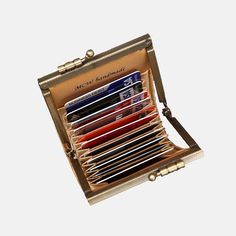 an open briefcase filled with lots of cards