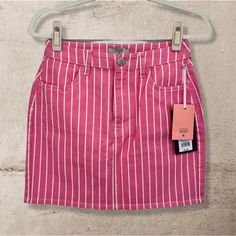 New With Tags Striped Pink Denim Mini Skirt Size 2 Pink With Vertical White Stripes Front Pockets Waist: 27 In, Hips: 37 In, Inseam Length: 8 In, Total Length: 16 In 98% Cotton, 2% Spandex Trendy High-waist Skirt For Spring, Trendy High Waist Skirt For Spring, Pink High-waisted Denim Skirt For Spring, Casual Pencil Skirt Skort For Spring, High Rise Skort For Spring Day Out, Pink Mini Denim Skirt For Summer, Pink Fitted Trendy Denim Skirt, Trendy Fitted Pink Denim Skirt, Pink High-waisted Fitted Denim Skirt