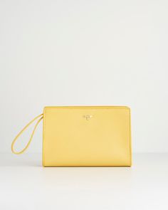 Like a little ray of sunshine, shining on your outfit, this wristlet pouch from our Meadow Creatures collection with its expertly crafted design comes in vibrant Sundress Yellow. Adding an instant pop of colour to any summer outfit, it’s a perfectly practical sized bag for all your everyday essentials. The chic, wrist handle allows hands free freedom, whilst Fable’s signature bee in gold-tone hardware adds a contemporary luxe finish.
  Key features:
  Approx. 19 (L) x 13 (H) x 6 (D) cm
 Outer: 1 Contemporary Luxe, Swan Jewelry, Luxury Christmas Gifts, Wristlet Pouch, Beauty Finds, Talisman Necklace, Ray Of Sunshine, Animal Brooch, Bottega Veneta Shoulder Bag