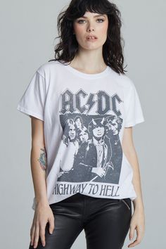 We're "livin' easy and lovin' free" with AC/DC! This vintage style rock tee is designed with black and white graphics from AC/DC's fifth studio album, "Highway To Hell". Made with soft cotton fabric, a ribbed crew neckline, short sleeves, and a classic oversized t-shirt fit. Details Style #302312 Color: White AC/DC Highway to Hell Concert Unisex T-Shirt Keyword: ACDC 100% Cotton Care/Import Machine Wash Cold, Tumble Dry Low Designed and Finished in Los Angeles Measurements Model is wearing size Edgy Short Sleeve T-shirt With Band Logo, Trendy Band Logo T-shirt For Concerts, Edgy Band Logo T-shirt For Summer, White Grunge T-shirt For Alternative Fashion, Edgy Tops For Music Festivals, Spring Graphic Tee For Alternative Fashion, Band Logo T-shirt For Concert, Edgy Letter Print T-shirt For Concerts, White Graphic Print T-shirt For Alternative Fashion