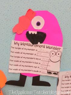 a paper cut out of a monster holding a sign that says, my measurement monster