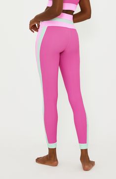 Sherbet-hued colorblock panels at the high waist and sides of these ultrasoft, ribbed second-skin leggings bring a sweet twist to a workout essential. Pull-on style 86% polyester, 14% spandex Machine wash, tumble dry Imported Activewear With Elastic Side Panels For Spring, Sporty Gym Activewear With Contrast Trim, Stretch Bottoms With Contrast Trim For Sports, Stretch Sports Bottoms With Contrast Trim, Sports Stretch Color Block Bottoms, Sporty Leggings With Ribbed Waistband, Sporty Color Block High Stretch Bottoms, Athleisure Activewear With Contrast Trim For Gym, Stretch Color Block Leggings For Sports