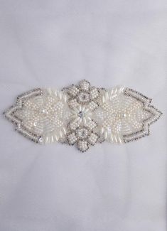 Symmetrical hand-made motif of pearls and beads | Etsy Elegant Embellished White Bridal Belt, Elegant White Bridal Belt With Pearl Embroidery, White Beaded Pearl Bridal Accessories, Beaded White Bridal Belt For Party, White Beaded Bridal Belt For Party, Elegant White Embellished Bridal Accessories, Silver Pearl Beaded Bridal Accessories, Silver Beaded Pearl Bridal Accessories, Elegant Pearl White Beaded Bridal Accessories