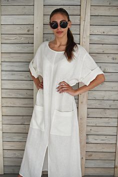 "Linen tunic / Beach dress / Holiday dress / Linen tunic dress / Long white summer dress / Loose linen dress / Maternity dress / Pure white The linen dress is with split and two big pockets in front. You can wear the dress with folded or unfolded sleeves. This elegant natural linen dress will impact the felling of freedom and original style for every women who will wear it. It is cozy, comfortable and soft, made from washed and softened medium weight natural Lithuanian linen. You can choose from Long White Summer Dress, White Long Dress Summer, Natural Linen Dress, Linen Tunic Dress, White Summer Dress, Dress Maternity, Big Pockets, Dress Linen, Womens Aprons