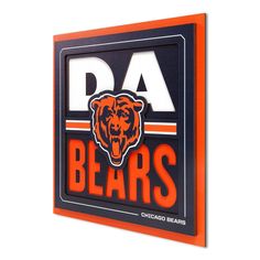 an orange and black chicago bears sign on a white wall with the word da bears