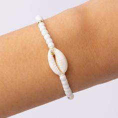 Material: gold plated brass Diameter: 2.25" + adjustable (pull-tie closure) IMPORTED Shell Bracelet, Shells, Gold Plate, Plating, Brass, Bracelet, Gold, White