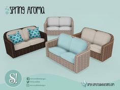 four wicker sofas and two chairs with blue pillows