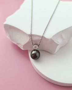 Bright, chic, lustrous and bold Tahitian pearl pendant that you have to have for your jewelry box. Both versatile and timeless, they will quickly become your go-to-necklace for everyday and special occasions.  Perfect gift to treat yourself or as a special gift that will be loved and cherished.  No two pearls are exactly the same. Embrace the perfect imperfection. Embrace uniqueness. Embrace individuality. Celebrate you. ♡ Sea Pearl Type: Tahitian Pearl♡  ✧ Tahitian Pearl size: Approx 8.5mm (wid Tahitian Pearl Necklaces For Anniversary, Elegant Tahitian Pearl Jewelry With Pearl Charm, Elegant Tahitian Pearl Drop Necklace, Elegant Pearl Necklace For Mother's Day Gift, Elegant Tahitian Pearl Necklace With Pearl Charm, Tahitian Pearl Drop Necklace As Gift, Tahitian Pearl Drop Necklace For Gift, Elegant Tahitian Pearl Pendant Jewelry, Tahitian Pearl Wedding Jewelry