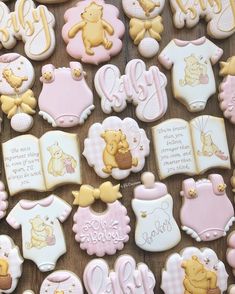 baby shower cookies are arranged on a table