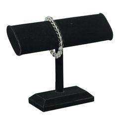 a black stand with a chain on it