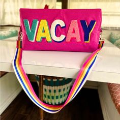 Make Sure Your Next Getaway Comes With Style! Our Hot Pink "Vacay" Weekender Bag Is Made Of Durable Terry Fabric And Is The Perfect Trendy Bag For Your Next Trip! It Has The Word "Vacay" Embroidered On The Front In A Super Cool, Party-Ready Array Of Colors That Match The Colors Of The Removable Strap. The Bag Also Comes With A Fun Removable Tassel For Some Added Pizzazz! Pack It Up, Take Off, And Enjoy Your Vacay In Style! Blakely Brand Brand New With Tags Corded Terry Fabric Hot Pink Trendy Rainbow Strap And Textured Letters ”Vacay” Patch Style Is Embroidered, So No Worries About Patches Coming Off! Removable Strap Removable Tassel On The Zipper Pull Includes Trendy Shoulder Bag With Embroidered Logo For Travel, Multicolor Bags With Embroidered Logo For Everyday Use, Travel Crossbody Bag With Embroidered Logo, Travel Shoulder Bag With Embroidered Logo, Travel Crossbody Shoulder Bag With Embroidered Logo, Pink Bag With Letter Embroidery For Everyday Use, Textured Letters, Nike Duffle Bag, Louis Vuitton Luggage Tag