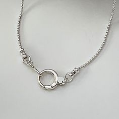 Solid 925 sterling silver rounded box chain, dainty 1.25mm width Solid Sterling Silver round push clasp, pendant clip, charm clip, 13mm width Shipping; Ships within one business day Free shipping in the USA Complimentary gift box with ribbon and wax seal stamp More items from my shop:  https://www.etsy.com/shop/LagunaLifeDesigns Minimalist Snake Chain Necklace With Sterling Silver Clasp, Everyday Sterling Silver Charm Necklace With Box Chain, Elegant Sterling Silver Charm Necklace With Box Chain, Sterling Silver Snake Chain Necklace With Lobster Clasp, Adjustable Sterling Silver Chain Necklace With Lobster Clasp, Minimalist Sterling Silver Charm Necklace With Box Chain, Sterling Silver Chain Necklace With Spring Ring Clasp, Minimalist Sterling Silver Link Charm Necklace, Silver Dainty Charm Necklaces With Box Chain