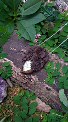 This handmade piece features flowers and leaves resting above a flashy checkercut Labradorite.  Artists Note: All pieces are handmade and therefore will have slight imperfections which are always apparent on the listed photographs. This is the nature of handmade items, which in my opinion adds to the character of each piece. You can rest easy knowing you have a unique one of a kind art piece created by a loving artist.  You can request a different length/color suede cord for corded necklaces. Pl Handmade Flower Pendant Nature Necklace, Handmade Nature-inspired Flower Pendant Necklace, Corded Necklaces, Hippie Flowers, Flower Crystal, Clay Flower, Suede Cord, Natural Sunlight, Necklace Boho