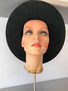 "Hard structure black felt hat. Seems to be an early hat, maybe as early as the 1930's. In good vintage condition. Measurements are: Circumference21\" Dome4\" Brim3\" Feel free to convo me with any further questions. Thank you for your interest." Vintage Wide Brim Felt Hat For Evening, Vintage Black Costume Hat With Flat Brim, Vintage Black Flat Brim Costume Hat, Vintage Black Adjustable Boater Hat, Vintage Adjustable Black Boater Hat, Vintage Curved Brim Felt Hat For Evening, Vintage Felt Hat With Curved Brim For Evening, Vintage Brimmed Felt Hat, Vintage Black Wide Brim Fedora