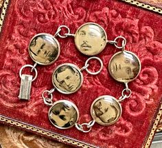 Men from the mid to late 1800's still live in these gem tintype photos taken from a mini photo album.  Their faces are set in a base and sealed in resin.  Six photos  grace this bracelet.    The photos are 5/8" in diameter.  A very unique tribute to an earlier time.  OldNouveau and MountainLaurel Handwork offer a reminiscent line of Antique Button Jewelry, Victorian cuffling bracelets, typewriter key items, Edwardian  postcard jewelry, merit and service pin bracelets, steampunk watch part jewelr Victorian Stamped Jewelry For Memorial, Victorian Stamped Collectible Jewelry, Victorian Stamped Jewelry For Memorials, Vintage Handmade Memorial Jewelry, Vintage Stamped Jewelry For Memorial, Antique Stamped Jewelry For Memorial, Bracelets Steampunk, Gothic Antique, Six Photos