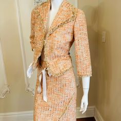 This Beautiful Dana Buchman Skirt Suit Features A Classic Houndstooth Pattern In A Multicolor Tweed Fabric. The Skirt And Blazer Set Includes 3/4 Sleeves With No Button Closure And A Regular Length Jacket. The Suit Is Perfect For Any Occasion, Whether It's A Wedding, Party, Or Formal Event. It Can Also Be Dressed Down For A Casual Look. The Garment Care For This Suit Is Dry Clean Only And It Is Made Of A Lightweight Blend Of Polyester, Nylon, Cotton, And Acrylic. The Jacket Lining Is Made Of Dou Fitted Tweed Jacket For Spring Tailoring, Fitted Pink Tweed Jacket For Formal Occasions, Pink Fitted Tweed Jacket For Formal Occasions, Fitted Pink Tweed Dress, Chic Pink Skirt Suit For Fall, Fitted Pink Tweed Jacket For Work, Chic Fitted Tweed Jacket For Spring, Fitted Tweed Dress For Spring, Spring Fitted Tweed Dress