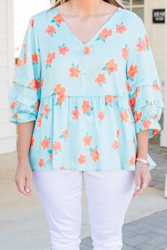 Experience the perfect blend of style and comfort with this mesmerizing top! The layered sleeve look adds a touch of elegance while the pretty mint color and floral pattern make it perfect for a brunch date! Elevate your wardrobe with this versatile and chic top! 100% Polyester Turquoise Floral Print Top For Spring, Chic Light Blue Floral Print Top, Casual Turquoise Top For Spring, Chic Turquoise Tops, Light Blue Flowy Blouse For Spring, Feminine Light Blue Blouse For Spring, Chic Turquoise Blouse For Spring, Feminine Light Blue Tops For Day Out, Light Blue Feminine Blouse For Brunch