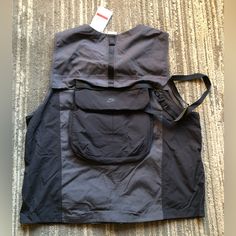 Nwt Nike Sportswear Tech Pack Unlined Black Vest Men Size Large Dm5534-060 $160 Great Condition! Unworn! Front Zip Closure Front Zip Pockets; Removable Back Pocket Carabiner And D-Ring On Detachable Cargo Bag Provide Secure Storage 100% Polyester With 100% Cotton Contrast Functional Black Windbreaker For Outdoor Work, Nike Nylon Hiking Outerwear, Functional Sports Outerwear With Side Pockets, Black Nylon Outerwear With Functional Pockets, Black Utility Outerwear For Hiking, Nike Functional Outerwear For Hiking, Nike Functional Outdoor Outerwear, Nike Black Outerwear For Hiking, Black Nylon Outerwear For Outdoor Work