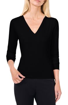 This sleek and classic V-neck top is cut from ultrastretchy body-sculpting fabric that shows off your natural shape. 24" length V-neck Long sleeves 90% polyester, 10% spandex Machine wash, tumble dry Imported Elegant V-neck Top, Stretch V-neck Top For Work, Fitted Solid Color V-neck Top, Solid Top With Smoothing Minimal Stretch, Elegant Seamless Stretch Tops, Elegant Fitted Smoothing Tops, Elegant Solid Color Elastane Top, Elegant Fitted Seamless Top, High Stretch Smoothing Solid Color Tops