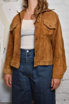 "Vintage 1960s \"Levi's\" Big E Suede Cowhide Leather Trucker Jacket. Collared, button closure, two pockets.  Feels Like Leather - no content label  Good Vintage Condition - marks  Fits Like Large Shoulder To Shoulder - 18.5\" Chest - 42\" Sleeve Length - 23.5\" Shoulder To Hem - 24\"" Leather Trucker Jacket, Trucker Jacket, Vintage 1960s, Cowhide Leather, 1960s, Jackets & Coats, Adult Outfits, Sleeve Length, Leather