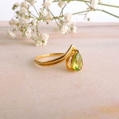 Natural Peridot, Pear Cut, 14k Solid Yellow Gold Ring JEWELRY INFORMATION MATERIAL: 14K Yellow Gold (Leave a message for pricing in 9k and 18k Gold) Stone: Natural Peridot Stone 1,1 CT Stone Cut: Pear Cut Stone Size: 8mm x 6mm Ring Finish: Polished For you or someone special... ########## LINKS ########## Follow the link for this Earring: https://www.etsy.com/listing/695217987 1. Follow the link for this Ring: https://www.etsy.com/listing/692202983 2. Follow the link for this Ring: https://www.e Yellow Gold Teardrop Ring For May Birthstone, Yellow Gold Teardrop May Birthstone Ring, Green Teardrop 14k Gold Ring, Pear-shaped Gold Emerald Ring, Yellow Gold Teardrop Ring With Birthstone, Gold Peridot Rings For Formal Occasions, Pear-shaped Yellow Gold Emerald Ring For Anniversary, Pear Shaped Emerald Ring In Yellow Gold For Anniversary, Pear-shaped Emerald Ring In Yellow Gold For Anniversary