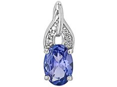 0.55ct Oval Tanzanite With 0.02ctw Round White Zircon Rhodium Over Sterling Silver Pendant.   Measures Approximately 0.56"L x 0.21"W. 3mm Bail. Lobster clasp with 2"extender. Accent stones primarily zircon. Diamond White Oval Jewelry With Birthstone, Oval Diamond White Jewelry With Birthstone, Oval Cubic Zirconia Gemstones With Diamond Accents, Oval Brilliant Cut Sterling Silver Gemstones, Oval Gemstones With Diamond Accents In Sterling Silver, Oval Diamond Jewelry With Accent Stones, Diamond Jewelry With Accent Stones In Oval Pendant, Diamond Jewelry With Accent Stones Oval Pendant, Diamond White Oval Jewelry With Accent Stones