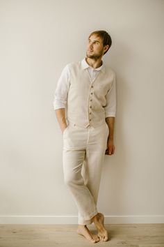 "Our linen rustic wedding suit is handmade to fit your unique measurements. We're proud that there are no factory involved in crafting our linen clothes for men. Each rustic wedding suit is carefully made with a focus on every little detail. DETAILS Color in the picture: ivory and snow white. Other colors are available. The model in the picture is 186 cm (6'1\") tall and is wearing size L. SIZING After you place your order, I will email you to request your measurements, ensuring a perfect fit fo Tailored Wedding Pants With Pockets, Beige Linen Suit For Wedding, Elegant Beige Pants For Wedding, Fitted Pants With Pockets For Wedding, Elegant Beige Wedding Pants, Tailored Linen Suit For Wedding, Beige Linen Wedding Suit, Classic White Pants For Wedding, Vintage Fitted Wedding Bottoms