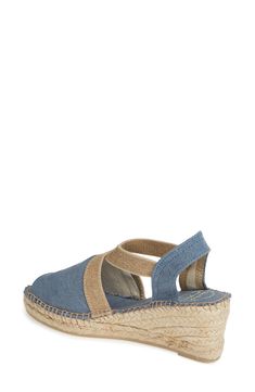 A jute-wrapped wedge and platform further the breezy warm-weather style of a casual-chic sandal. 1 1/4" heel; 1" platform (size 8-8.5US / 39EU) 3" strap height Slip-on style Textile upper and lining/synthetic sole Made in Spain Women's Shoes Sandal Style, Chic Sandals, Wedge Espadrille, Sandal Women, Blue Fabric, Women Style, Sandal Espadrille, Warm Weather, Casual Chic