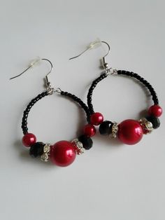 Black and red earring and bracelet set Black and red beaded | Etsy Adjustable Red Beaded Earrings With Black Beads, Elegant Red Hoop Earrings, Elegant Red Beaded Hoop Earrings, Red Round Beaded Party Earrings, Red Earrings With Black Beads As Gift, Red Earrings With Black Beads For Gift, Black Hoop Earrings With Colorful Beads For Gift, Black Hoop Earrings With Colorful Beads As Gift, Gift Black Hoop Earrings With Colorful Beads