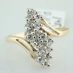 This 14k Yellow Gold Cluster Ring Contains .33ctw Of G/H Color Vs Clarity Round Brilliant Natural Diamonds. 14k Gold Cluster Diamond Ring, Classic 14k Gold Cluster Diamond Ring, Cluster Jewelry For Anniversary, White Cluster Ring Stamped 14k, White Diamond Ring Stamped 14k, 14k Gold Cluster Diamond Ring Fine Jewelry, 14k Gold Cluster Jewelry With Single Cut Diamonds, Fine Jewelry Cluster Anniversary Jewelry, Fine Jewelry Cluster Jewelry For Anniversary