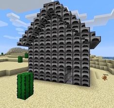 a very large building made out of some sort of blocks in the middle of a desert