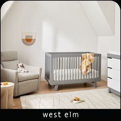 a baby crib in the corner of a room