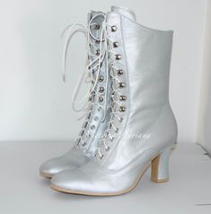 Request a Custom Order and have something made just for you! This is an individual boot execution fantastic for all seasons, great and for Victorian wedding :) Beautiful female Victorian / French High Heel Boots inspired from 1900's  booties style. All materials very qualitative Amazing Italian optic light metallic silver bright polish Leather  You can get remarkable and not expensive handmade boots.  Mid calf height: height of the heel 2,6" inch/ 7 cm length of the boot from the bottom of the s Formal Winter Lace-up Boots With Closed Toe, Formal Lace-up Boots For Winter With Closed Toe, Formal Closed Toe Lace-up Winter Boots, Formal Closed Toe Lace-up Boots For Winter, Fitted Lace-up Boots With Reinforced Heel And Closed Toe, Silver Fitted Ankle Boots, Fitted Lace-up Wedding Boots, Silver Fitted Boots For Wedding, Silver Boots With Reinforced Heel