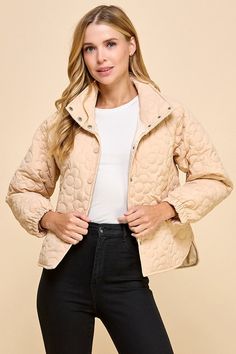 This cute beige jacket boasts a charming floral quilted pattern and playful button down style. Stay cozy and stylish in this unique piece! Fit: True to size. Fabric: 100% polyester Quilted Button-up Winter Outerwear, Cream Button-up Outerwear With Snap Buttons, Cozy Beige Outerwear With Button Closure, Cozy Cream Button-up Outerwear, Cozy Spring Button-up Outerwear, Cozy Button-up Spring Outerwear, Cream Quilted Long Sleeve Outerwear, Cream Quilted Outerwear For Spring, Cream Quilted Spring Outerwear