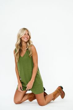 Green One Piece Romper Summer Shortalls With Side Pockets And Relaxed Fit, Summer Shortalls With Pockets In Relaxed Fit, Summer Relaxed Fit Shortalls With Pockets, Relaxed Fit Summer Shortalls With Pockets, Summer Style Relaxed Fit Shortalls With Pockets, Sleeveless Summer Shortalls With Pockets, Casual Sleeveless Shortalls For Beach, Green Vacation Jumpsuits With Pockets, Green Jumpsuits And Rompers With Pockets For Vacation