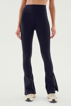 We added a stylish side split hem to our best-selling high waist Raquel. The 4-way stretch supplex fabric is supportive and opaque for a confident workout. And a sleek silhouette that shapes the waist line, elongates and slims on the body. BEST FOR: yoga, CrossFit, barre, Pilates and gym workouts. Flare Leggings Outfit, Barre Pilates, Yoga Pants Outfit, Flare Leggings, Side Split, Split Hem, Outfits With Leggings, Pretty Dresses, Crossfit