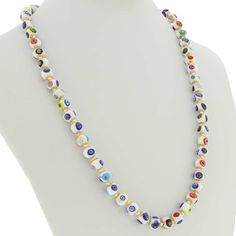 Add a touch of classic Venetian style to your outfit with this elegant Murano millefiori necklace. Centuries-old Murano glass technique perfected by Italian master craftsmen is used to create colorful mosaic effect that is fun and trendy, yet classic and timeless. This is a unique accessory that will brighten up your look and your day. Each necklace measures 24 inches in length and comes with an attractive velvet pouch and a certificate of authenticity. Because each item is a unique work of art White Glass Necklace With Colorful Beads, White Single Strand Glass Necklace, Colorful Mosaic, Italian Leather Handbags, Murano Glass Jewelry, Glass Christmas Tree Ornaments, Handmade Handbags, Christmas Figurines, Glass Christmas Tree