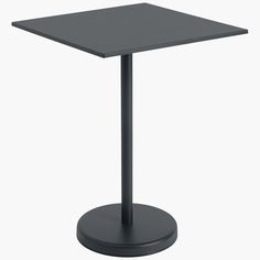 a black square table with a metal base on an isolated white background for use as a mockup