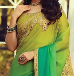 COLOR : Shaded Olive & Green FABRIC : Saree - Burberry Silk, Blouse - Burberry Silk & Net WORK : Resham Embroidery, Zari, Sequins, Stones, Motifs & Lace BorderOCCASION : Party Wear, Festival READY-TO-WEAR : No STITCHING : Available as semi-stitched fabric, can be stitched using standard size option (+$20). Note: There might be a slight color variation due to lighting and flash used during photoshoot. The bright shade seen is the best closer view of fabric's color. Net Blouse Designs, Saree Party, Net Blouse, Sari Design, Saree Designer, Net Blouses, Blouse Design Images, Gota Work, Party Wear Saree