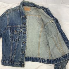 Levi’s denim big E jacket 1950-70s Size: no size listed/fits like large Chest-20” shoulder-6” sleeve-23” top to bottom-22” Vintage Denim Blue Long Sleeve Denim Jacket, Levi's Retro Denim Jacket With Pockets, Vintage Long Sleeve Denim Vest In Dark Wash, Vintage Levi's Dark Wash Outerwear, Vintage Levi's Denim Outerwear, Levi's Vintage Denim Outerwear, Vintage Levi's Medium Wash Outerwear, Vintage Levi's Medium Wash Denim Jacket, Levi's Vintage Medium Wash Outerwear