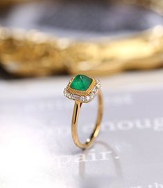 *Condition: Brand new *Center Stone: Natura Emerald from Zambia, approx 0.68ct, 6x6mm (IF clarity, 5A color) *Side Stone: Natural White Diamond, Round Cut & Baguette Cut (VS1 clarity and F color) *Gold Weight: 3.41g (depand the ring size) *Ring Dimension: approx 10x10x8.5mm *Metal Purity: Can be select Each piece is made-to-order with care and special attention to detail. all items are made with conflict-free diamonds and gems. Size: made to order The item will be gift wrapped and shipped. - Yellow Gold Emerald Diamond Ring With Halo Design, Fine Jewelry Yellow Gold Emerald Ring With Halo Design, Exquisite Yellow Gold Diamond Ring With Gemstone, Exquisite Yellow Gold Emerald Diamond Ring, Yellow Gold Emerald Ring With Halo Design, Heirloom Yellow Gold Emerald Ring With Halo Design, Luxury Gold Emerald Ring With Halo Design, Luxury 14k Gold Emerald Ring With Halo Setting, Elegant Emerald Ring With Halo Diamond Design