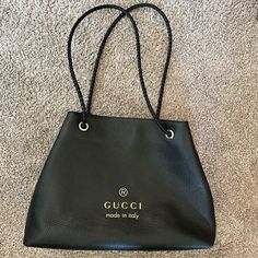 Authentic Gucci Black Leather Shoulder Bag With Beautiful Braided Handle. Measurements: 10.14" -14.04" (Maximum) Depth 4.68" Shoulder Strap 13.07" Extremely Good Condition And Well Kept! No Marks Or Scratches Interior Has Very Minor Marks Of Usage But Still Looks Brand New Beautiful And Well Kept Bag! Like New! Gucci Evening Tote Shoulder Bag, Chic Gucci Shoulder Bag For Daily Use, Gucci Calf Leather Shoulder Bag With Branded Hardware, Gucci Calf Leather Bag With Branded Hardware, Gucci Leather Lined Shopping Bag, Chic Gucci Office Bag, Chic Gucci Bag With Silver-tone Hardware, Gucci Formal Shoulder Bag With Dust Bag, Chic Gucci Shoulder Bag For Office