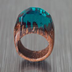 "Handmade green ring of wood and resin with forest inside. Beauty Gift. Length 21 mm / 0,83\" Width 10 mm / 0,39\" Height 31 mm / 1.22\" *Sizes are noted as an example. Chief dimensions are to be specified for each ring. I adapt overall proportions of a ring to your finger size to achieve harmony and beauty in each particular case. So please make sure you measured your finger right. I pick over the best materials while manufacturing rings. Natural high-quality wood out of noble tree species encl Unique Green Resin Ring, Unique Green Resin Rings, Epoxy Ring, Epoxy Projects, Resin Rings, Green Ring, Wood And Resin, Green Rings, Wooden Ring