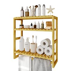 a wooden shelf with towels, toiletries and other items on it in front of a white background