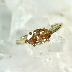 a close up of a ring on some ice