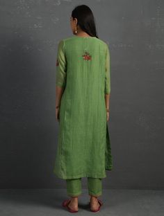 A straight-cut kurta in cotton silk fabric with all-over floral buttis made using A straight-cut kurta in cotton silk fabric with all-over floral buttis made using beads, sequins and silk French knots. Kurta, pants and dupatta have a lace edging at the hem, side cut, and sleeve ends. Bead work runs along the neckline and in between lace patterns. Delicate pin tucks stitched across the organza dupatta with embroidered scalloped edges and machine stitches in between pin tucks. Elasticated waist co Machine Stitches, Kurta Pants, Cotton Silk Fabric, Green Hand, French Knots, Organza Dupatta, Side Cuts, Scalloped Edges, Kurta Set