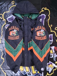 Vintage 1990s Miami Hurricanes Black Orange Green Arm Logos Starter Jacket XXL Like new 10/10 XXL 31 x 31.5 Pit to Pit Starter Jacket 90s, Black Throwback Outerwear For College, Vintage Black Windbreaker For Winter, 90s Black Long Sleeve Outerwear, Vintage Streetwear Windbreaker For Fall, Vintage Windbreaker For Fall Streetwear, Vintage Fall Windbreaker For Streetwear, 90s Style Hooded Outerwear For College, Vintage Black Windbreaker For Streetwear