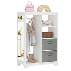 an open closet with clothes, shoes and handbags on the shelf next to it