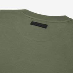 Crafted with the finest 100% Pima cotton, our Men's Men's Relaxed Pima Cotton T-Shirt is a timeless essential perfect for a relaxed look. Made in Peru 100% Pima Cotton No logo Ribbed crew neck Relaxed fit Classic Green Top For Streetwear, Classic Green Tops For Streetwear, Classic Everyday Khaki Tops, Classic Khaki Tops For Everyday, Classic Green Relaxed Fit T-shirt, Green Classic Relaxed Fit T-shirt, Olive Relaxed Fit Cotton Top, Olive Cotton Top With Relaxed Fit, Olive Cotton Crew Neck Tops